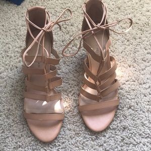 Nude wedges that have been barely worn